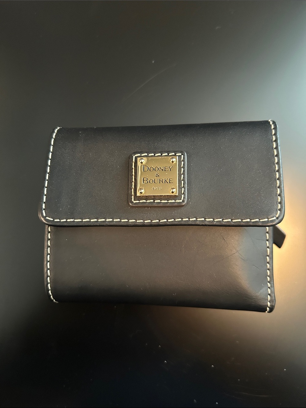 Dooney & Bourke Black Leather Trifold Wallet with white Contrast Stitching